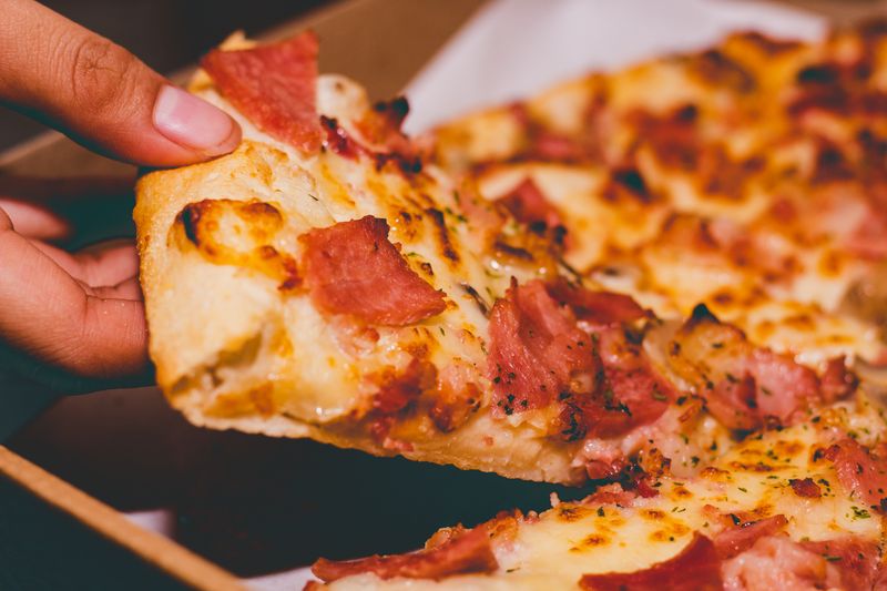 Pequod's pizza — fresh deep dish ready for delivery
